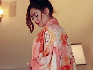 Beautiful Cassie Laine touches her tits together with hips